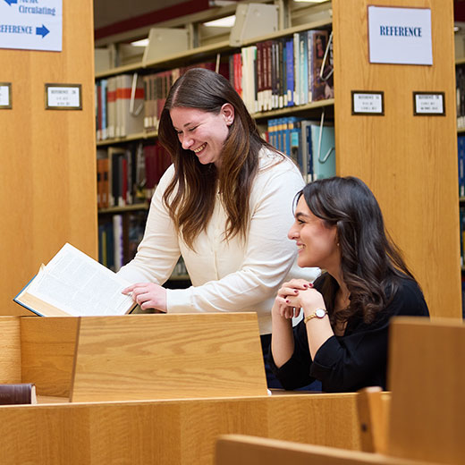 Students studying in the library. Links to Closely Held Business Stock